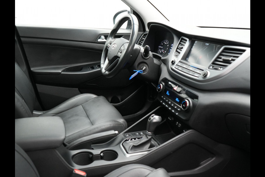 Hyundai Tucson 1.6 T-GDI Premium Automaat | Panodak | Lederen Sportstoelen Verwarmd | Trekhaak Afneembaar | Apple Carplay | Navigatie | Cruise Control | Climate Control | Camera | L.M. 19" |