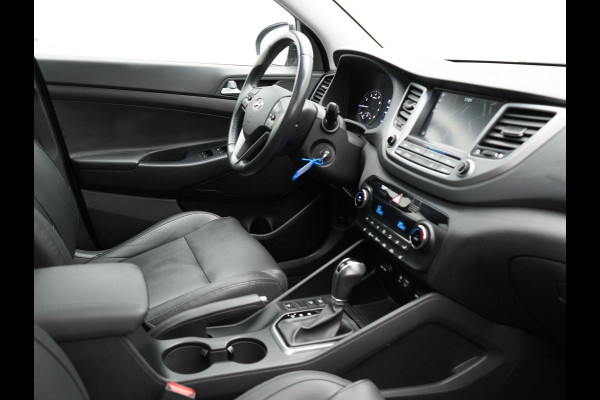 Hyundai Tucson 1.6 T-GDI Premium Automaat | Panodak | Lederen Sportstoelen Verwarmd | Trekhaak Afneembaar | Apple Carplay | Navigatie | Cruise Control | Climate Control | Camera | L.M. 19" |