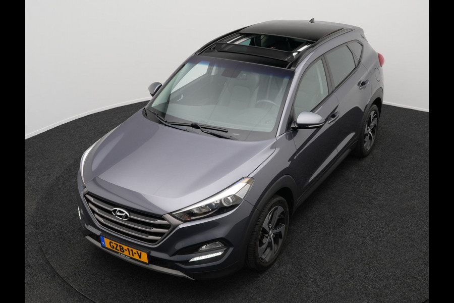Hyundai Tucson 1.6 T-GDI Premium Automaat | Panodak | Lederen Sportstoelen Verwarmd | Trekhaak Afneembaar | Apple Carplay | Navigatie | Cruise Control | Climate Control | Camera | L.M. 19" |