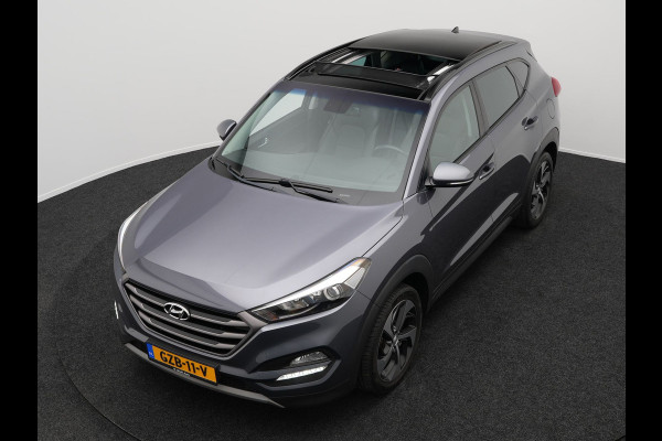 Hyundai Tucson 1.6 T-GDI Premium Automaat | Panodak | Lederen Sportstoelen Verwarmd | Trekhaak Afneembaar | Apple Carplay | Navigatie | Cruise Control | Climate Control | Camera | L.M. 19" |