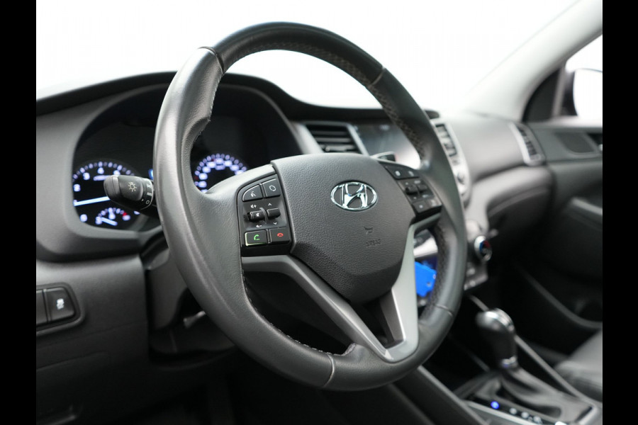 Hyundai Tucson 1.6 T-GDI Premium Automaat | Panodak | Lederen Sportstoelen Verwarmd | Trekhaak Afneembaar | Apple Carplay | Navigatie | Cruise Control | Climate Control | Camera | L.M. 19" |