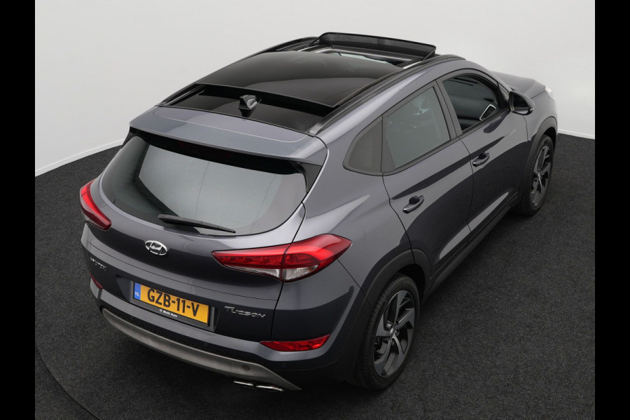 Hyundai Tucson 1.6 T-GDI Premium Automaat | Panodak | Lederen Sportstoelen Verwarmd | Trekhaak Afneembaar | Apple Carplay | Navigatie | Cruise Control | Climate Control | Camera | L.M. 19" |