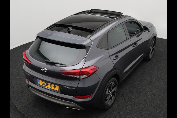 Hyundai Tucson 1.6 T-GDI Premium Automaat | Panodak | Lederen Sportstoelen Verwarmd | Trekhaak Afneembaar | Apple Carplay | Navigatie | Cruise Control | Climate Control | Camera | L.M. 19" |