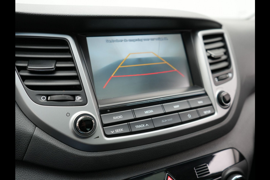 Hyundai Tucson 1.6 T-GDI Premium Automaat | Panodak | Lederen Sportstoelen Verwarmd | Trekhaak Afneembaar | Apple Carplay | Navigatie | Cruise Control | Climate Control | Camera | L.M. 19" |