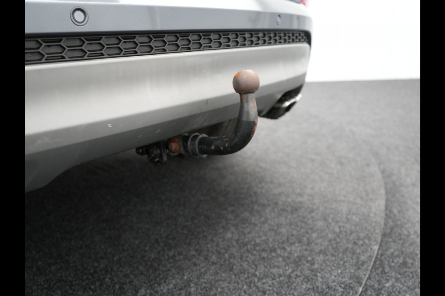 Hyundai Tucson 1.6 T-GDI Premium Automaat | Panodak | Lederen Sportstoelen Verwarmd | Trekhaak Afneembaar | Apple Carplay | Navigatie | Cruise Control | Climate Control | Camera | L.M. 19" |