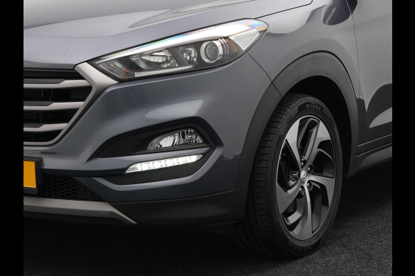 Hyundai Tucson 1.6 T-GDI Premium Automaat | Panodak | Lederen Sportstoelen Verwarmd | Trekhaak Afneembaar | Apple Carplay | Navigatie | Cruise Control | Climate Control | Camera | L.M. 19" |