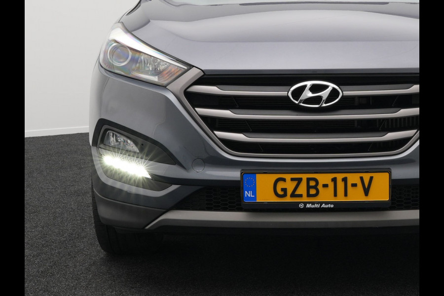 Hyundai Tucson 1.6 T-GDI Premium Automaat | Panodak | Lederen Sportstoelen Verwarmd | Trekhaak Afneembaar | Apple Carplay | Navigatie | Cruise Control | Climate Control | Camera | L.M. 19" |