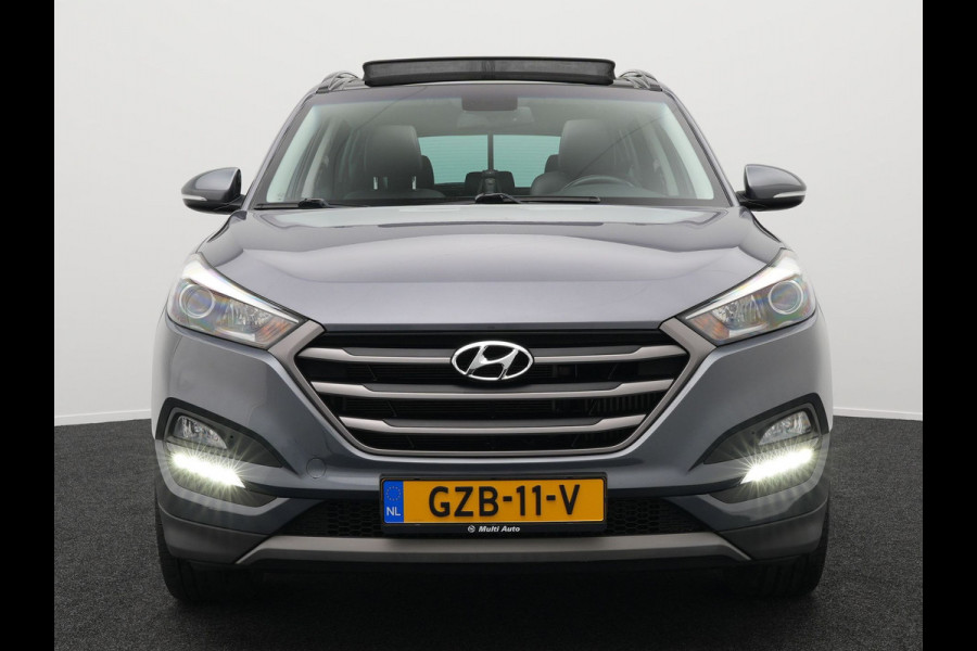 Hyundai Tucson 1.6 T-GDI Premium Automaat | Panodak | Lederen Sportstoelen Verwarmd | Trekhaak Afneembaar | Apple Carplay | Navigatie | Cruise Control | Climate Control | Camera | L.M. 19" |