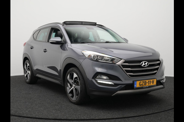 Hyundai Tucson 1.6 T-GDI Premium Automaat | Panodak | Lederen Sportstoelen Verwarmd | Trekhaak Afneembaar | Apple Carplay | Navigatie | Cruise Control | Climate Control | Camera | L.M. 19" |