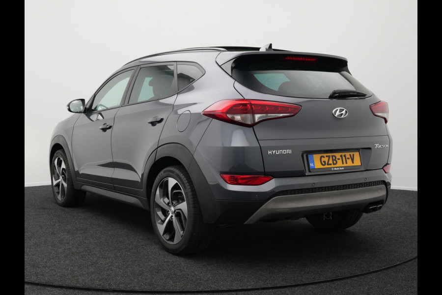 Hyundai Tucson 1.6 T-GDI Premium Automaat | Panodak | Lederen Sportstoelen Verwarmd | Trekhaak Afneembaar | Apple Carplay | Navigatie | Cruise Control | Climate Control | Camera | L.M. 19" |