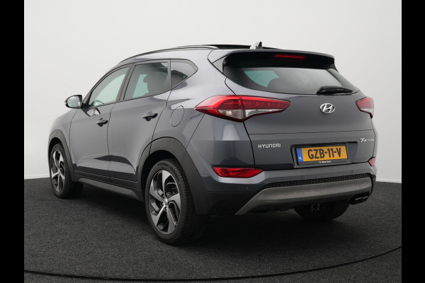 Hyundai Tucson 1.6 T-GDI Premium Automaat | Panodak | Lederen Sportstoelen Verwarmd | Trekhaak Afneembaar | Apple Carplay | Navigatie | Cruise Control | Climate Control | Camera | L.M. 19" |