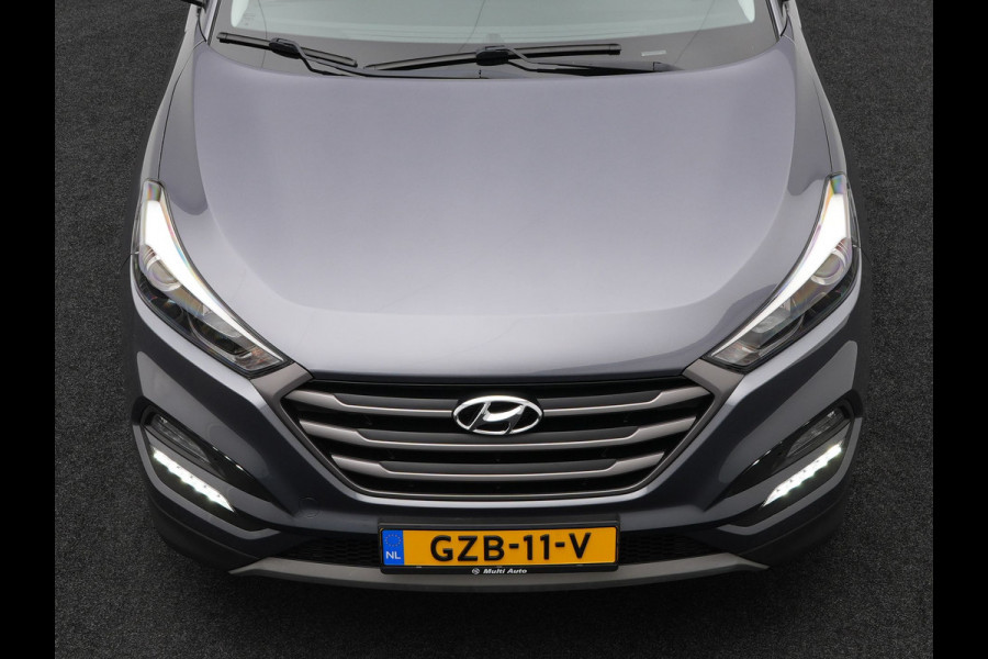 Hyundai Tucson 1.6 T-GDI Premium Automaat | Panodak | Lederen Sportstoelen Verwarmd | Trekhaak Afneembaar | Apple Carplay | Navigatie | Cruise Control | Climate Control | Camera | L.M. 19" |