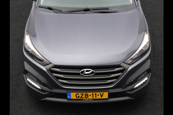 Hyundai Tucson 1.6 T-GDI Premium Automaat | Panodak | Lederen Sportstoelen Verwarmd | Trekhaak Afneembaar | Apple Carplay | Navigatie | Cruise Control | Climate Control | Camera | L.M. 19" |