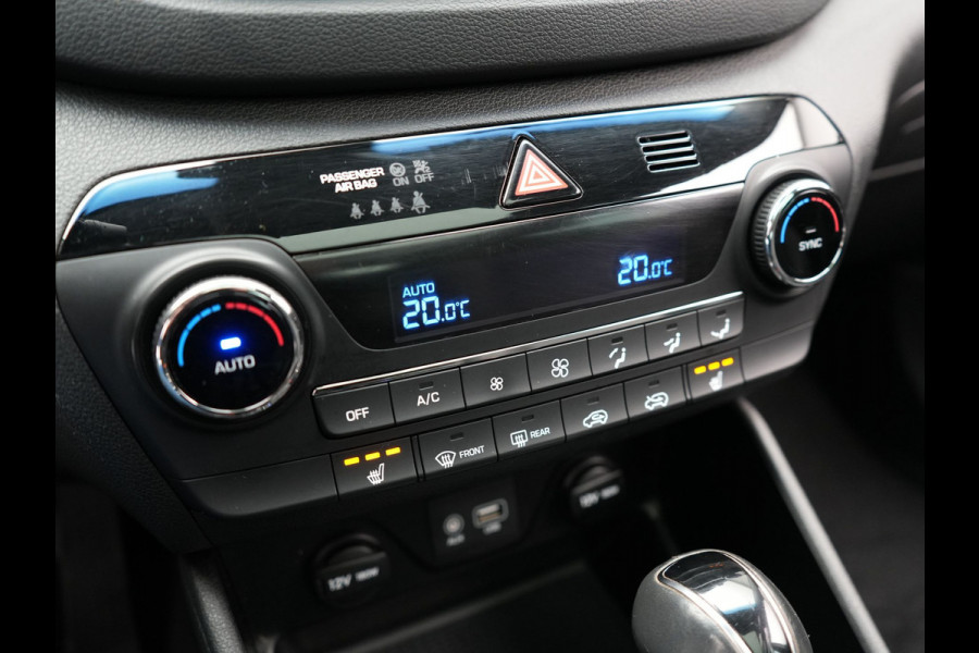 Hyundai Tucson 1.6 T-GDI Premium Automaat | Panodak | Lederen Sportstoelen Verwarmd | Trekhaak Afneembaar | Apple Carplay | Navigatie | Cruise Control | Climate Control | Camera | L.M. 19" |