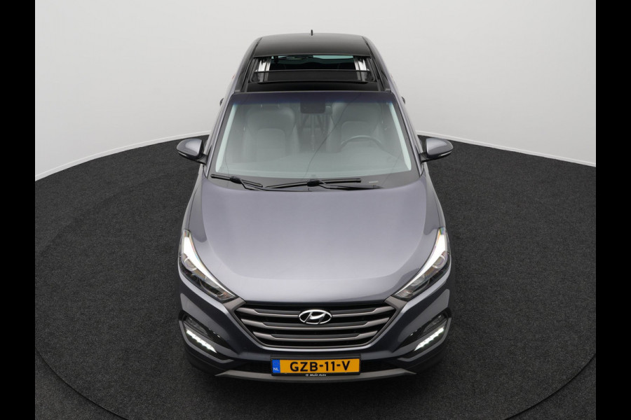 Hyundai Tucson 1.6 T-GDI Premium Automaat | Panodak | Lederen Sportstoelen Verwarmd | Trekhaak Afneembaar | Apple Carplay | Navigatie | Cruise Control | Climate Control | Camera | L.M. 19" |