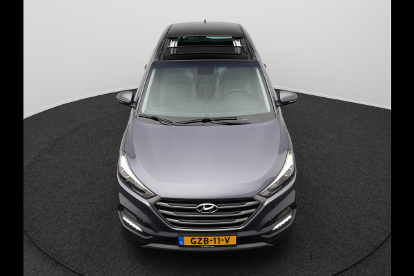 Hyundai Tucson 1.6 T-GDI Premium Automaat | Panodak | Lederen Sportstoelen Verwarmd | Trekhaak Afneembaar | Apple Carplay | Navigatie | Cruise Control | Climate Control | Camera | L.M. 19" |
