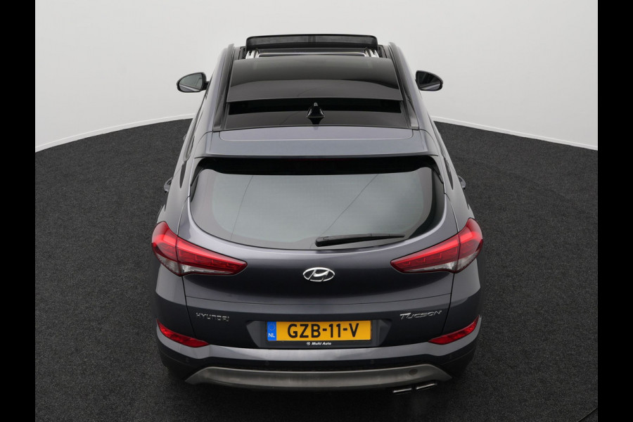 Hyundai Tucson 1.6 T-GDI Premium Automaat | Panodak | Lederen Sportstoelen Verwarmd | Trekhaak Afneembaar | Apple Carplay | Navigatie | Cruise Control | Climate Control | Camera | L.M. 19" |