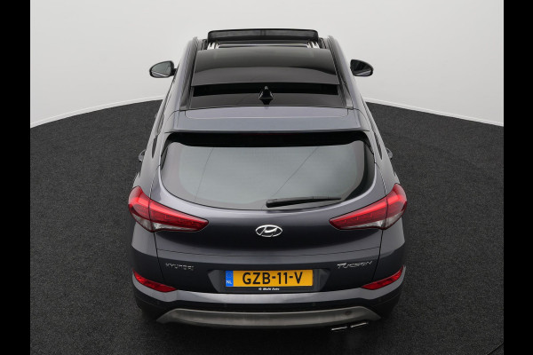Hyundai Tucson 1.6 T-GDI Premium Automaat | Panodak | Lederen Sportstoelen Verwarmd | Trekhaak Afneembaar | Apple Carplay | Navigatie | Cruise Control | Climate Control | Camera | L.M. 19" |
