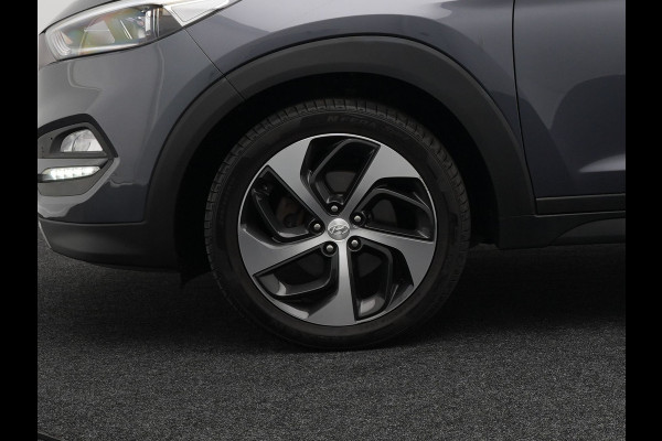 Hyundai Tucson 1.6 T-GDI Premium Automaat | Panodak | Lederen Sportstoelen Verwarmd | Trekhaak Afneembaar | Apple Carplay | Navigatie | Cruise Control | Climate Control | Camera | L.M. 19" |