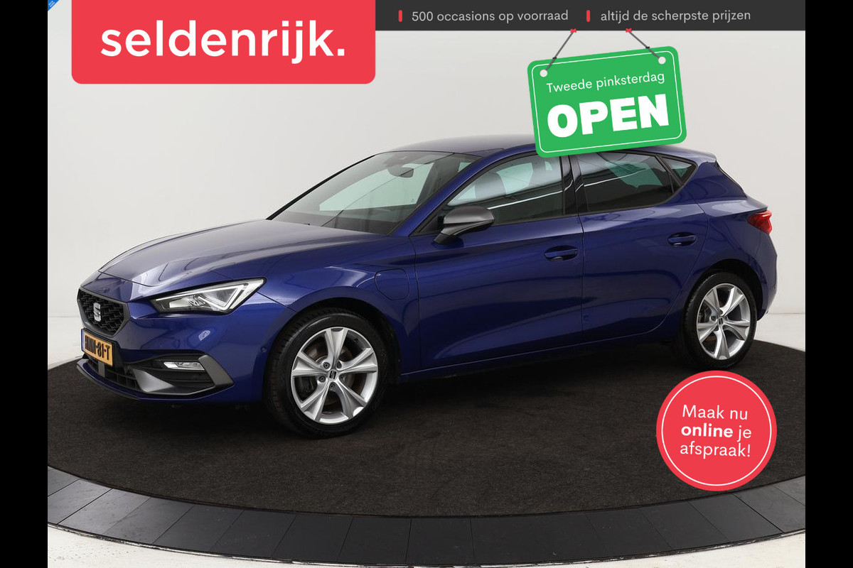 Seat Leon 1.4 eHybrid PHEV FR | Stoel & stuurverwarming | Camera | Adaptive cruise | Carplay | Keyless | Sfeerverlichting | Memory | Half leder | Navigatie | Full LED Seat Leon 1.4 eHybrid PHEV FR | Stoel & stuurverwarming | Camera | Adaptive cruise | Carplay | Keyless | Sfeerverlichting | Memory | Half leder | Navigatie | Full LED