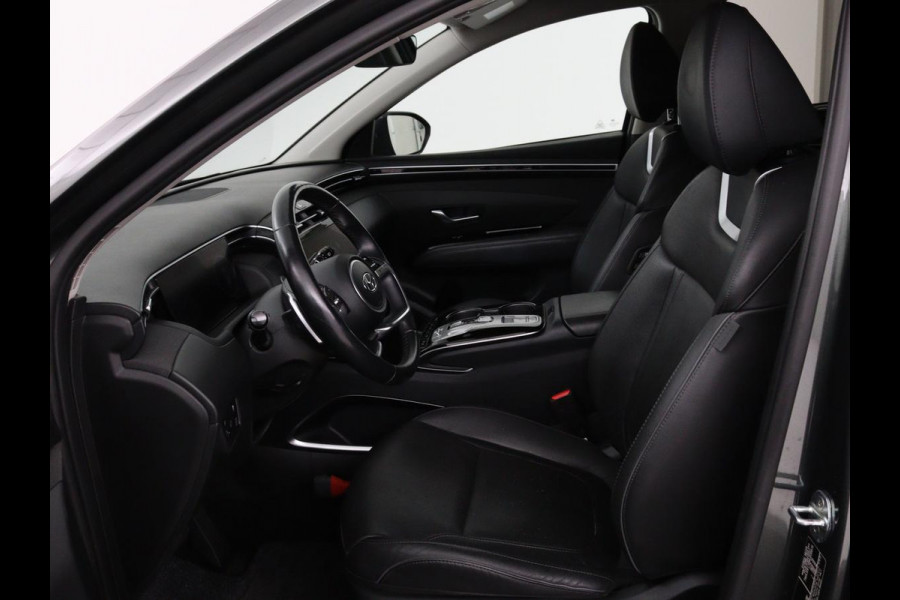 Hyundai Tucson 1.6 T-GDI HEV Premium | Leder | Stoelventilatie | Adaptive cruise | 360 camera | Carplay | Stuurverwarming | Memory | Navigatie | Full LED