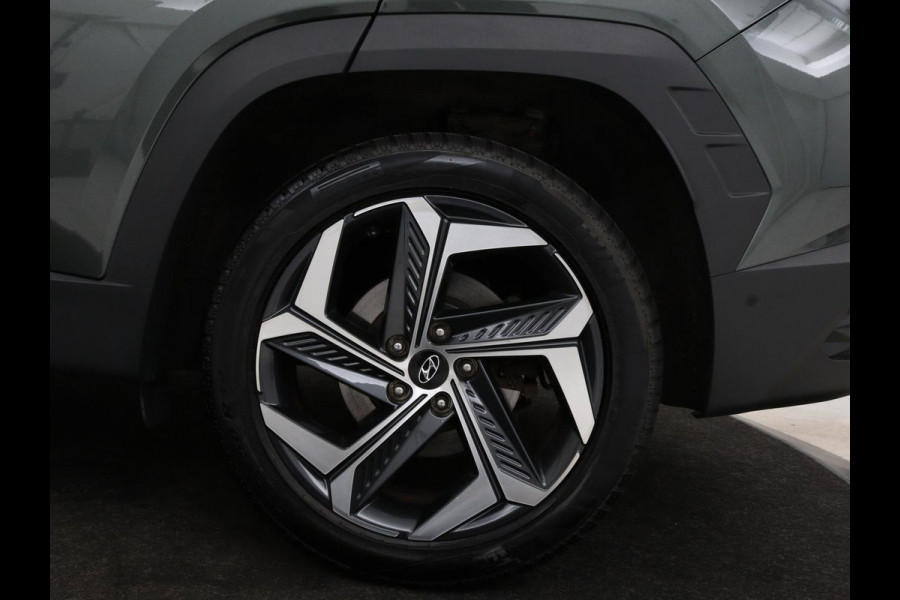 Hyundai Tucson 1.6 T-GDI HEV Premium | Leder | Stoelventilatie | Adaptive cruise | 360 camera | Carplay | Stuurverwarming | Memory | Navigatie | Full LED