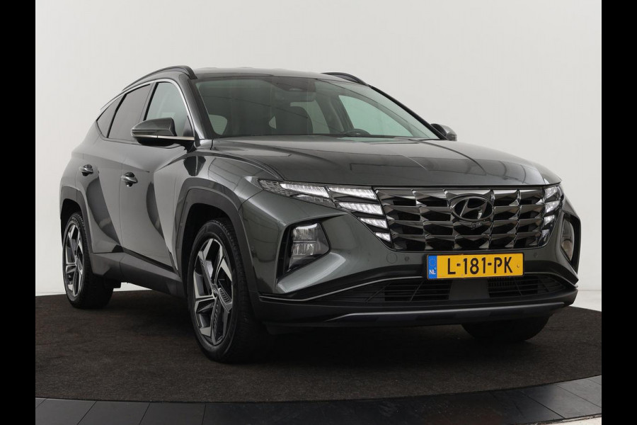 Hyundai Tucson 1.6 T-GDI HEV Premium | Leder | Stoelventilatie | Adaptive cruise | 360 camera | Carplay | Stuurverwarming | Memory | Navigatie | Full LED