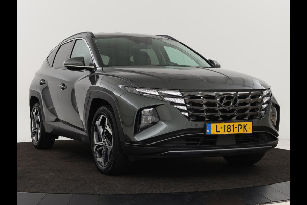 Hyundai Tucson 1.6 T-GDI HEV Premium | Leder | Stoelventilatie | Adaptive cruise | 360 camera | Carplay | Stuurverwarming | Memory | Navigatie | Full LED