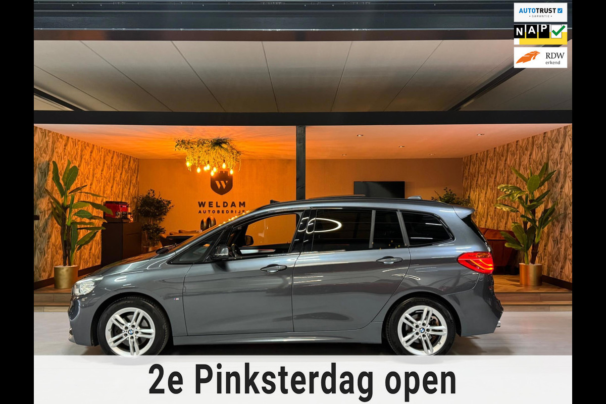 BMW 2 Serie Gran Tourer 218i M Sport Garantie Trekhaak Pano Head-up Camera Navi StoelVW Sfeer Cruise Clima Elekachterklep Rijklaar BMW 2 Serie Gran Tourer 218i M Sport Garantie Trekhaak Pano Head-up Camera Navi StoelVW Sfeer Cruise Clima Elekachterklep Rijklaar