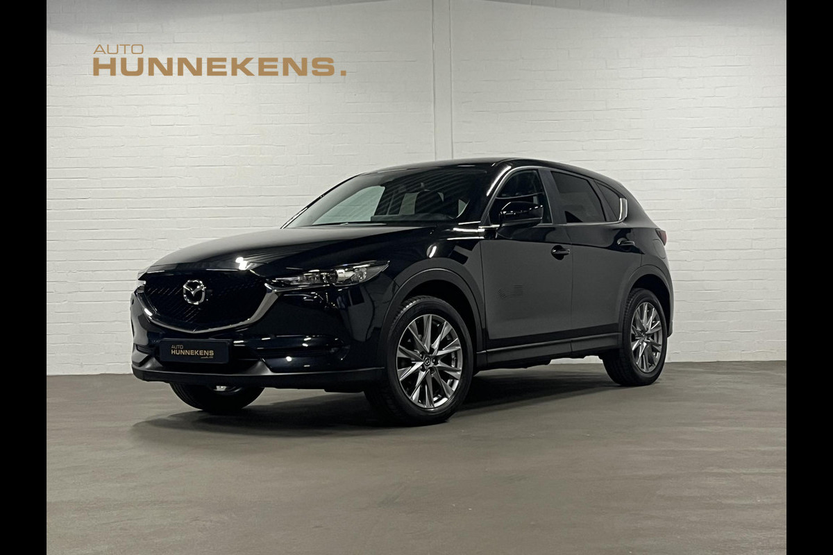 Mazda CX-5 2.0 SkyActiv-G 165 Comfort Trekhaak | Head-up | 360 Camera | Cruise & Climate control | Stoel-/Stuurwiel verwarming Mazda CX-5 2.0 SkyActiv-G 165 Comfort Trekhaak | Head-up | 360 Camera | Cruise & Climate control | Stoel-/Stuurwiel verwarming