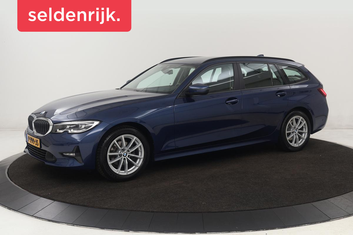 BMW 3 Serie 318i Business Edition | Stoelverwarming | Camera | Carplay | Live Cockpit | Full LED | Navigatie | Dodehoek detectie | Climate control