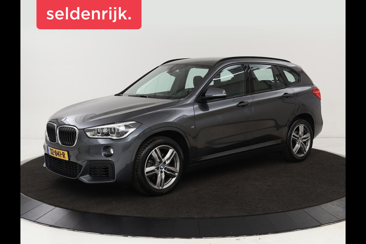 BMW X1 sDrive18i M Sport | Stoelverwarming | Head-Up | Sportstoelen | Full LED | Alcantara | Navigatie | Park Assist | Climate control BMW X1 sDrive18i M Sport | Stoelverwarming | Head-Up | Sportstoelen | Full LED | Alcantara | Navigatie | Park Assist | Climate control