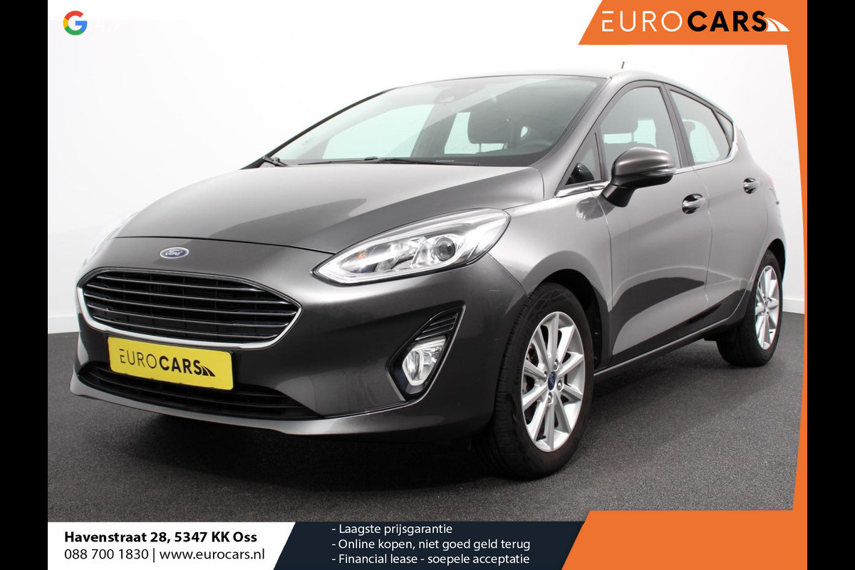 Ford Fiesta 1.0 EcoBoost 125pk Titanium | Navigatie | Apple Carplay/Android Auto | Parkeersensor achter | Cruise Control | Stoel-en stuurverwarming | Verwarmde voorruit | Climate Control Ford Fiesta 1.0 EcoBoost 125pk Titanium | Navigatie | Apple Carplay/Android Auto | Parkeersensor achter | Cruise Control | Stoel-en stuurverwarming | Verwarmde voorruit | Climate Control