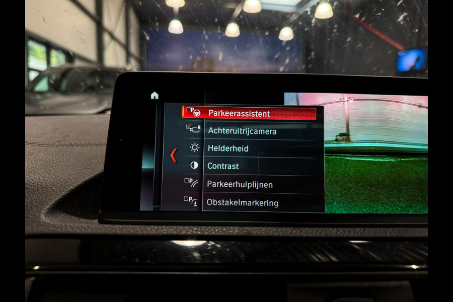 BMW 1-serie M140i xDrive High Executive 6cilinder|Pano|H/K|Leder|Memory|340pk