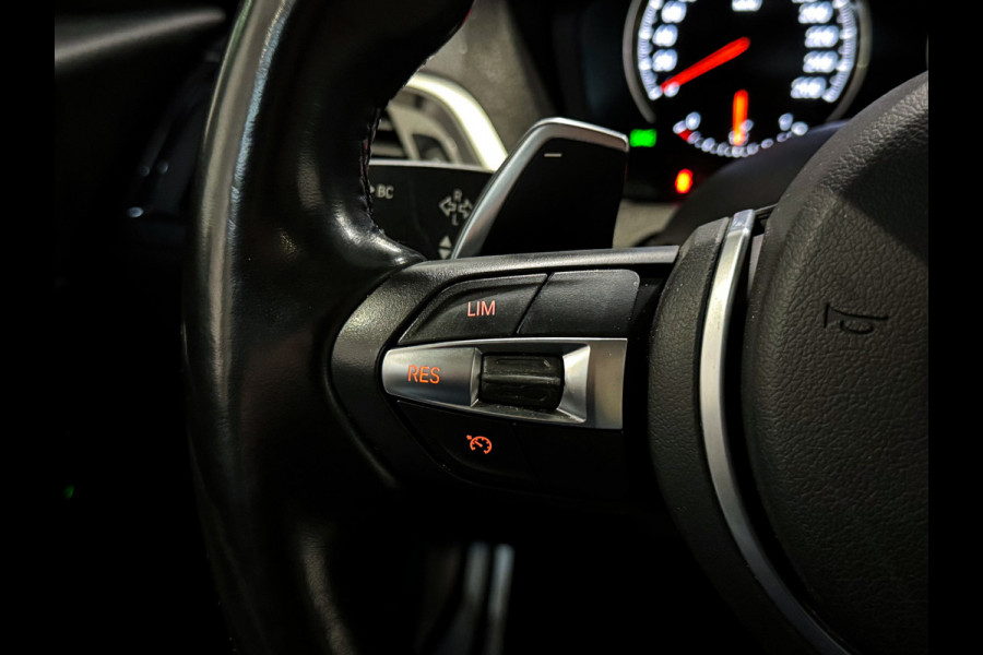 BMW 1-serie M140i xDrive High Executive 6cilinder|Pano|H/K|Leder|Memory|340pk