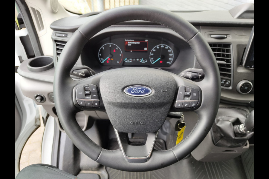 Ford Transit 350 D130pk L4H3 Navi Camera Pdc Apple Carplay Android WiFi-vb Airco Cruise Control Voorruit-Verwarmd 2.0TDCI Regensensor DAB Schuifdeur Betonplex Vloer Wandbetimmering Roll Stability Control Led Spoorwisselassist Euro 6 Zeer Compleet!
