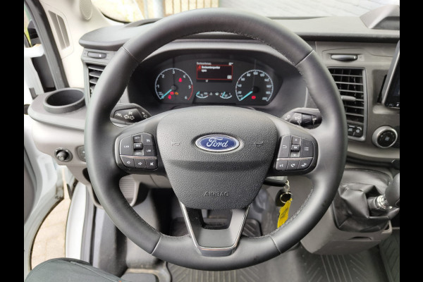 Ford Transit 350 D130pk L4H3 Navi Camera Pdc Apple Carplay Android WiFi-vb Airco Cruise Control Voorruit-Verwarmd 2.0TDCI Regensensor DAB Schuifdeur Betonplex Vloer Wandbetimmering Roll Stability Control Led Spoorwisselassist Euro 6 Zeer Compleet!