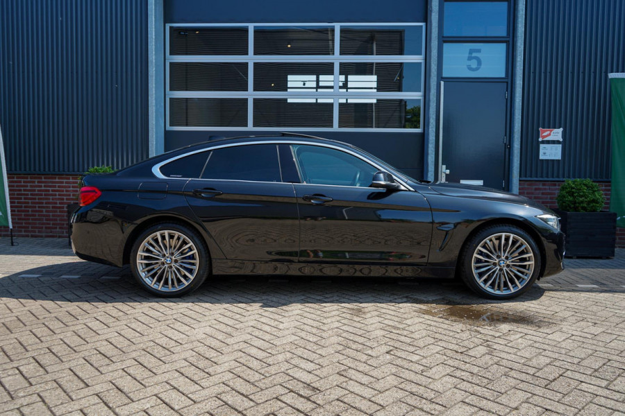 BMW 4 Serie Gran Coupé 440i xDrive High Executive | Adaptive Cruise | Harman/Kardon | Memory | Head-up | Trekhaak