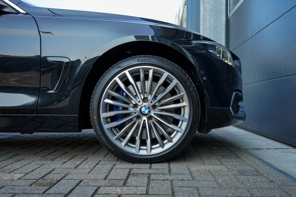 BMW 4 Serie Gran Coupé 440i xDrive High Executive | Adaptive Cruise | Harman/Kardon | Memory | Head-up | Trekhaak