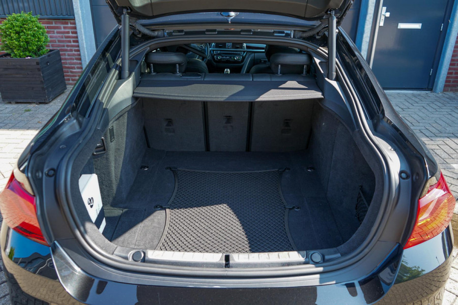 BMW 4 Serie Gran Coupé 440i xDrive High Executive | Adaptive Cruise | Harman/Kardon | Memory | Head-up | Trekhaak