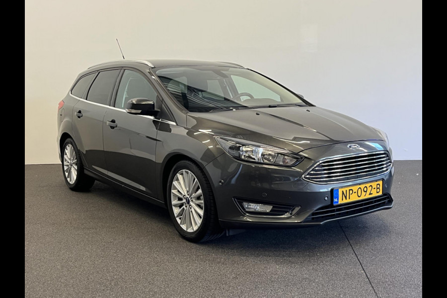 Ford FOCUS Wagon 1.0 Titanium Navigatie Parkeersensoren Park Assist Cruise Control Lichtmetalen velgen Climate Control
