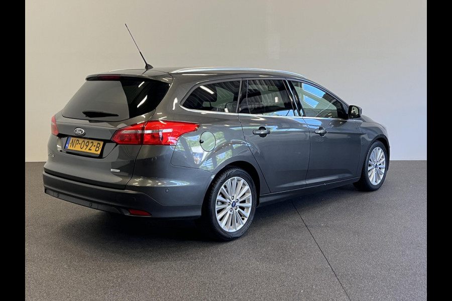 Ford FOCUS Wagon 1.0 Titanium Navigatie Parkeersensoren Park Assist Cruise Control Lichtmetalen velgen Climate Control