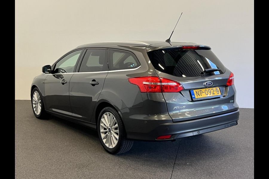 Ford FOCUS Wagon 1.0 Titanium Navigatie Parkeersensoren Park Assist Cruise Control Lichtmetalen velgen Climate Control
