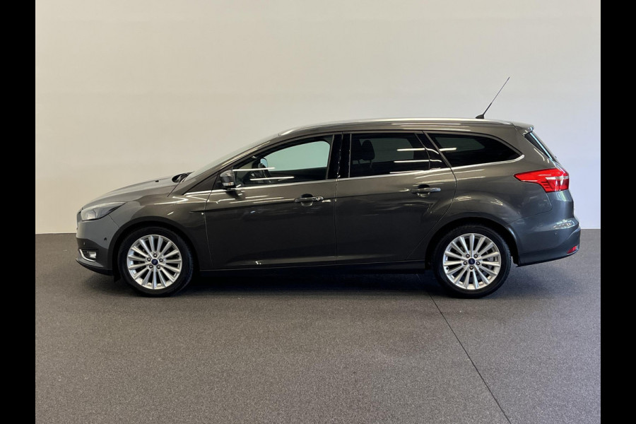 Ford FOCUS Wagon 1.0 Titanium Navigatie Parkeersensoren Park Assist Cruise Control Lichtmetalen velgen Climate Control