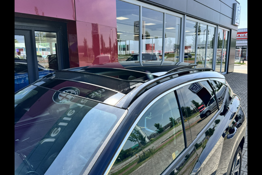 Hyundai Tucson 1.6 T-GDI HEV Premium Sky | Panorama | Carplay | Stoelverwarming voor en achter | dodehoekdetectie