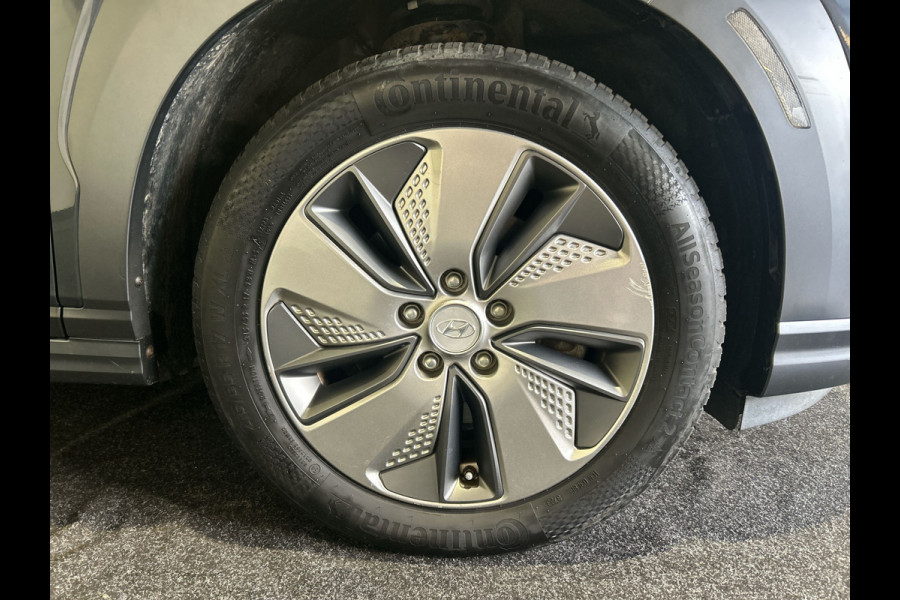 Hyundai Kona EV Premium 64 kWh | Warmtepomp | Verwarmde en geventileerde stoelen | Soh (batterijcheck) 91,8 %