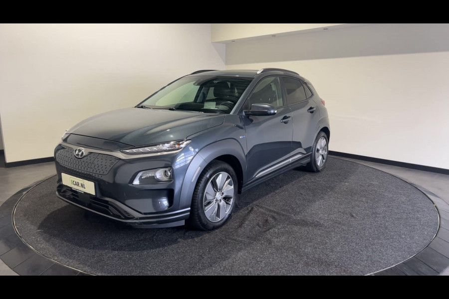 Hyundai Kona EV Premium 64 kWh | Warmtepomp | Verwarmde en geventileerde stoelen | Soh (batterijcheck) 91,8 %