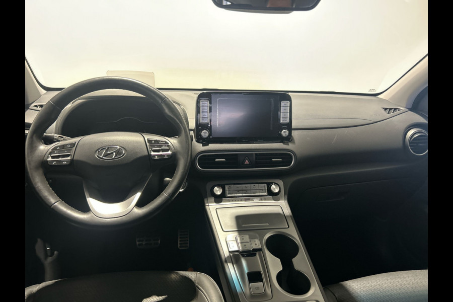 Hyundai Kona EV Premium 64 kWh | Warmtepomp | Verwarmde en geventileerde stoelen | Soh (batterijcheck) 91,8 %