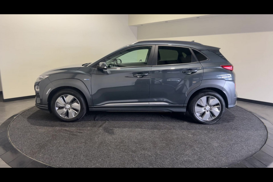 Hyundai Kona EV Premium 64 kWh | Warmtepomp | Verwarmde en geventileerde stoelen | Soh (batterijcheck) 91,8 %