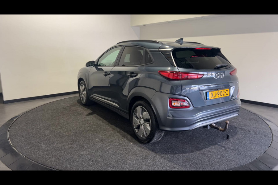 Hyundai Kona EV Premium 64 kWh | Warmtepomp | Verwarmde en geventileerde stoelen | Soh (batterijcheck) 91,8 %